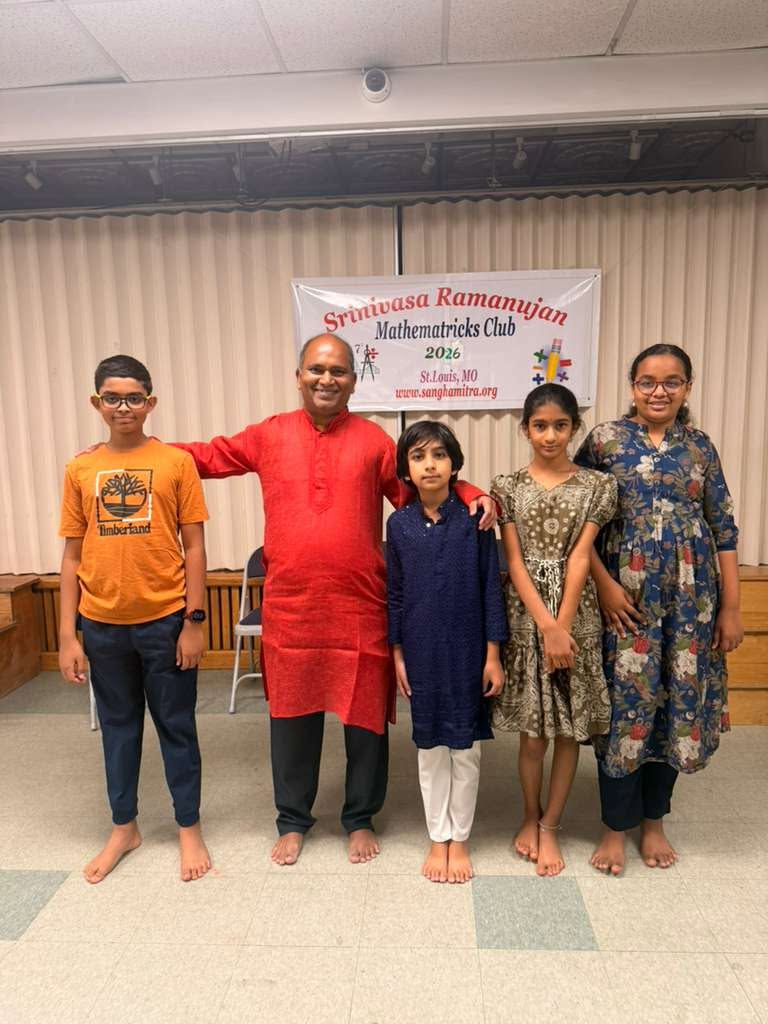 Sreenivasa Ainapurapu with students after Medhavadhanam 2026 at the Hindu Temple of St. Louis